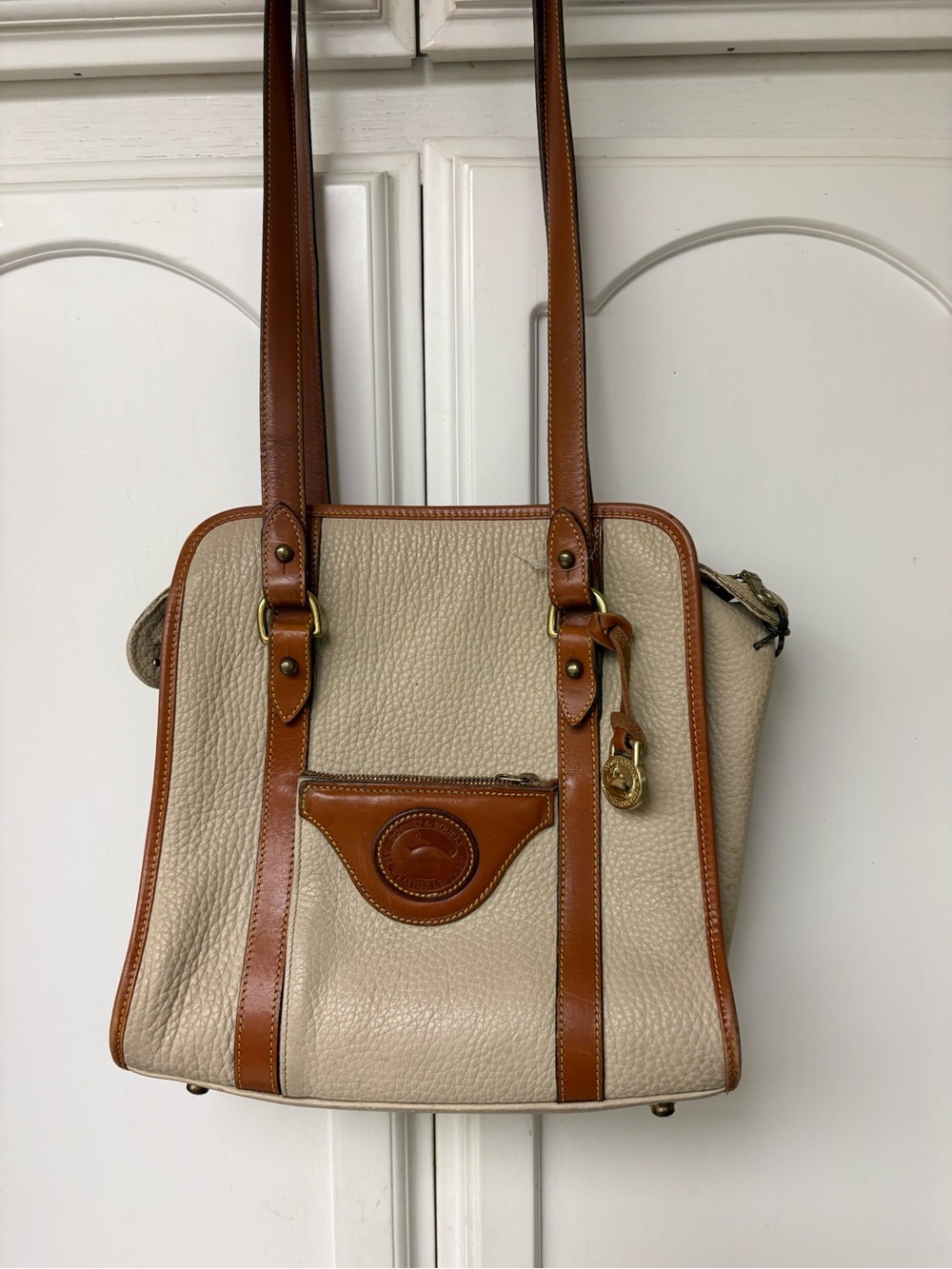 Dooney & Bourke Cream and Tan Pebbled Leather Shoulder Bag